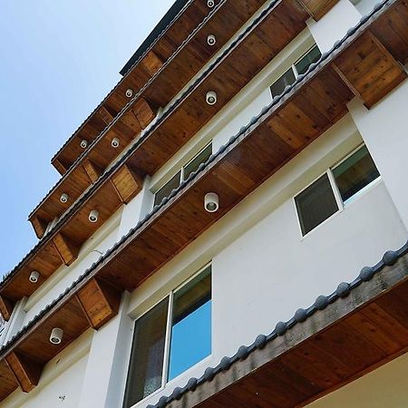Xiu Shui Hotel Ючи Екстериор снимка
